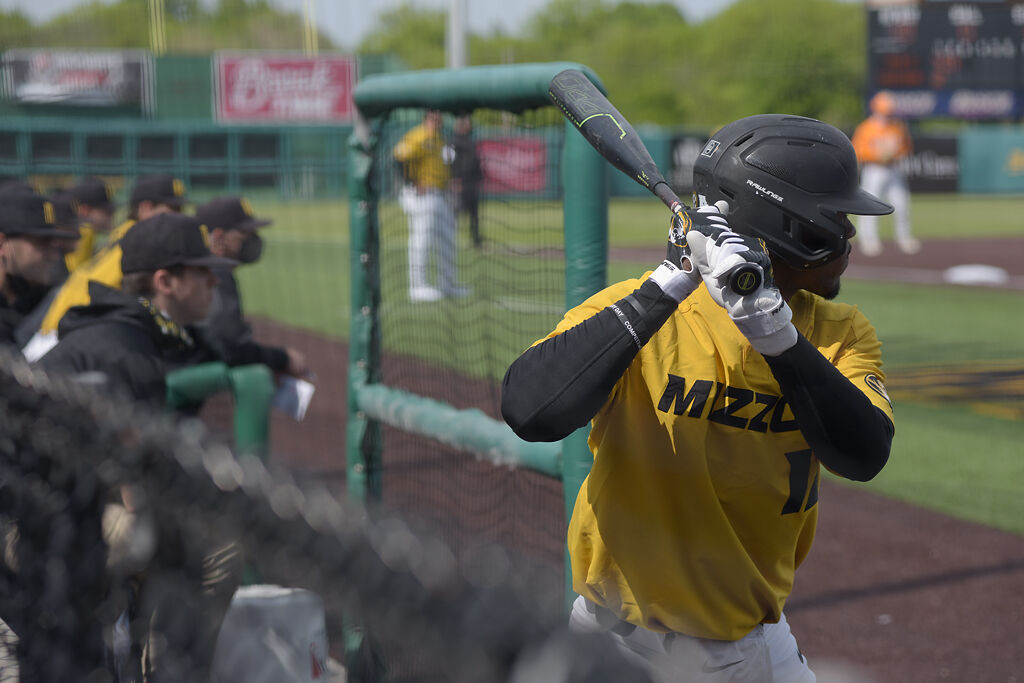 Joshua Day practices his swing before stepping up to bat on Saturday in Columbia.